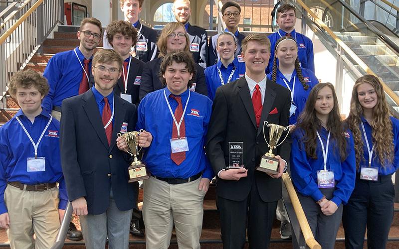 Fannin County High School Technology Students of America members proudly display the awards they won at the State Conference in Athens. From left are, front row, Chevy Phillips, James Kyle, Luke Pelfrey, Bryce Ware, Isabella Carr, and Alexis Howe; second row, Tyler Ensley, Seth Hughes, Logan Martin, Caitlin O’Mara, Fox Sharp; and, third row, Conner Kyle, Sam Jabaley, Carnaceo Dixon, and Devyn Caruthers.