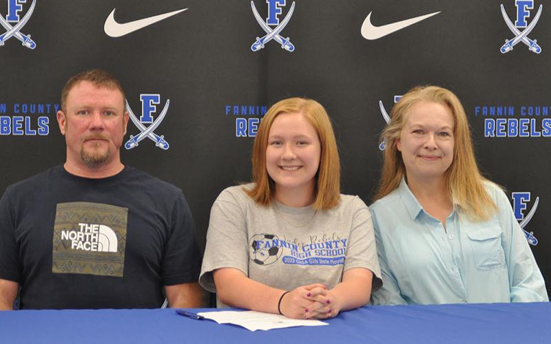 Fannin County High School senior Ivy Hyde signed her letter of intent to continue her academic and athletic career as part of the Dalton State College (DSU) women’s soccer team. Hyde plans on pursing a Health and Wellness degree while attending DSU. Shown are, from left, father Chris Hyde, signee Ivy Hyde, and mother Kristi Hyde.