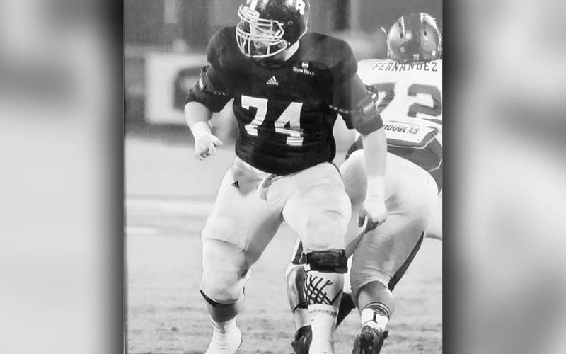 Logan Daves pictured in action at Georgia Southern University during his collegiate football career as an offensive lineman.