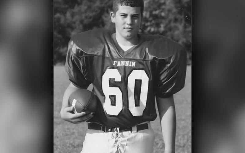 Logan Daves smiles for a photo as a young man at Fannin County Middle school.