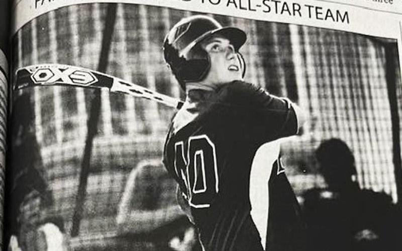 Jordan Farmer watches the ball fly as he hit during his high school baseball career.