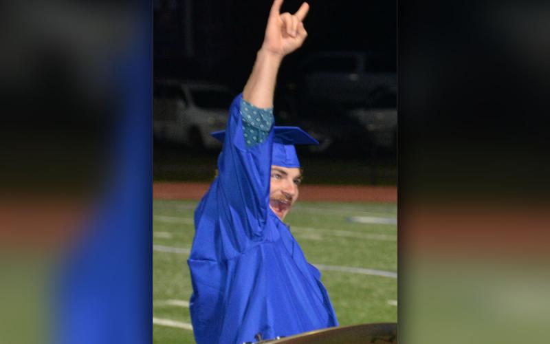 Wyatt Crawford shows his excitement after receiving his Fannin County High School diploma.