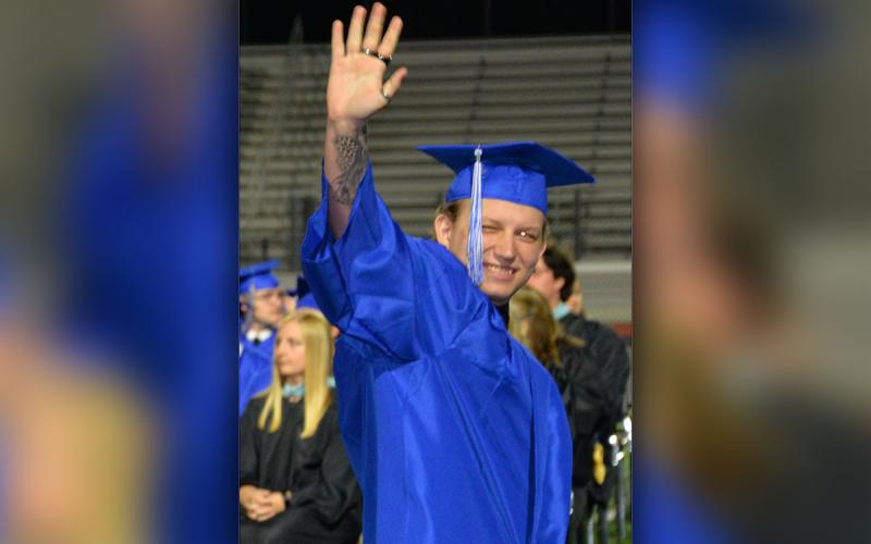 Smiles and waves were everywhere after graduates received their diplomas.