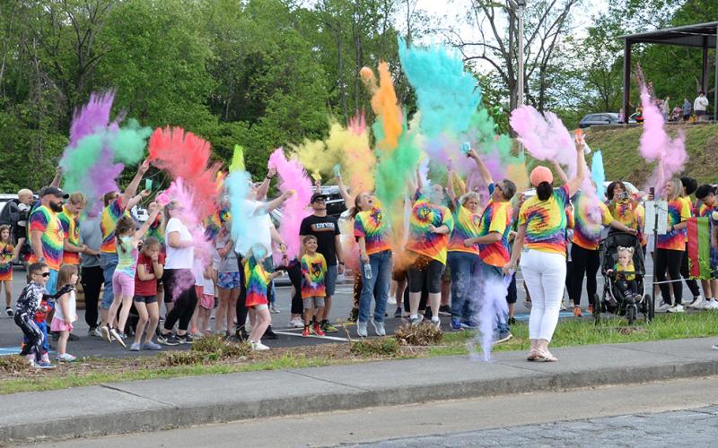 Sydnie’s Sunset Fun Run, a color run in honor of Sydnie Jones, was part of the festivities that dedicated the skate park bearing her name, Syd’s Place, in Blue Ridge Saturday. This splash of color kicked off the run.