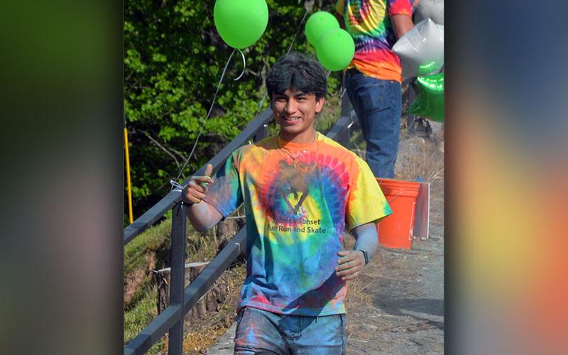 There was no shortage of colored chalk on this young man Saturday.