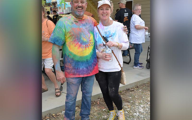 Sydnie Jones’ parents, Tony and Melinda Jones, were part of the crowd that enjoyed the dedication of Syd’s Place. Tony turned out of be just a little more “colorful” after Sydnie’s Sunset Run Saturday in Blue Ridge.