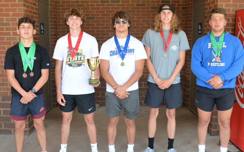 Fannin’s boys team earned fourth place at the GHSA State Championship earning them a trophy and spot on the podium. Shown with the trophy are, from left, Zechariah Prater, Tyler Stevenson, Corbin Davenport, Grayson Willis and Matthew Crowder.