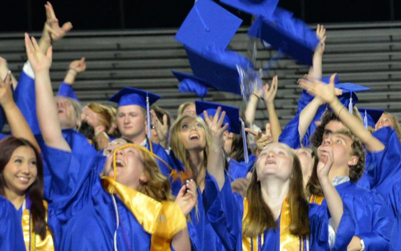 Members of the Fannin County High School Class of 2023 celebrate at the conclusion of graduation ceremonies Friday night on the football field at the high school.