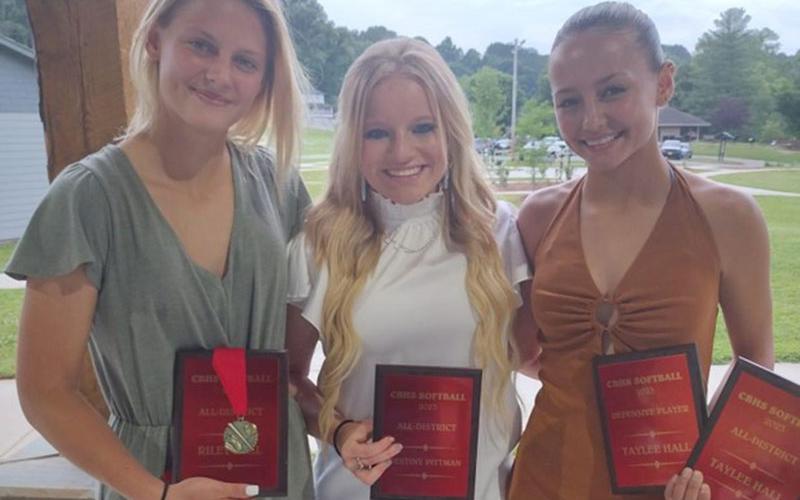Riley Hall, Destiny Pittman and Taylee Hall are shown with the honors they received at the Copper Basin Lady Cougar softball banquet.