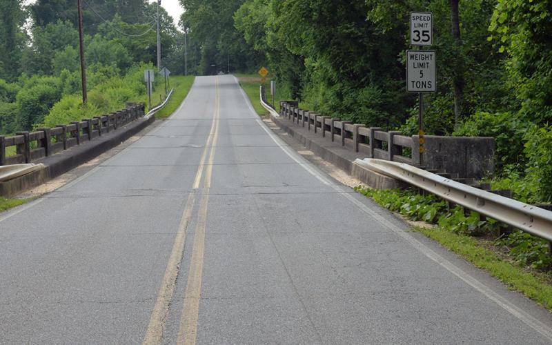 The Madola Road bridge over Fightingtown Creek is clearly marked with a weight limit of five tons. However, this is part of the route outlined for trucks carrying biosolids. Their weight was found to be as high as 73,000 pounds by law enforcement officers. The route is outlined in the pilot program plans filed with the Tennessee Department of Conservation and Environment.