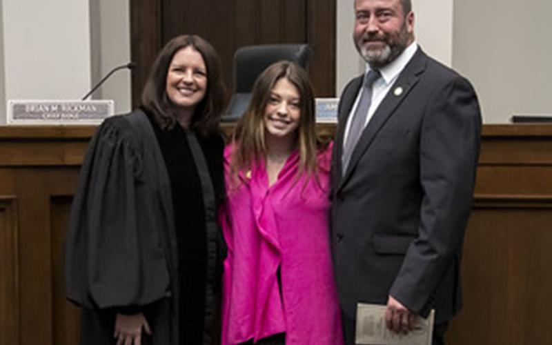 Amanda Mercier is shown with her husband, Joe Foster, and daughter, Alexandria, after taking her oath of office as the new chief judge of the Georgia Court of Appeals. Her term officially begins July 1.