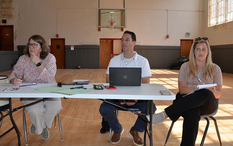 Leigh Elkins, Danny Bivins and Kaitlin Messich, from left, of the Carl Vinson Institute of Government at the University of Georgia listen to ideas from citizens regarding the future of the Ocoee Whitewater Center.