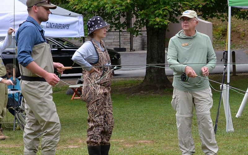 John Jenkins, right, of the Blue Ridge Mountain Chapter of Trout Unlimited, helped at Ron Henry Horseshoe Bend Park with fly fishing instructions.