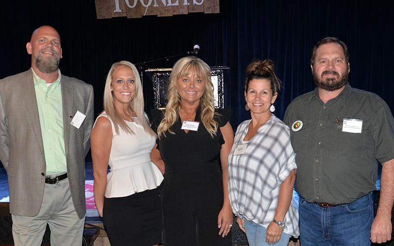 Several Polk County officials were present for the opening reception of the annual TVA Ocoee Whitewater Rafting and Fly Fishing Event. Among them were, from left, Director of Schools James Jones, commissioners Samantha Trantham and Kelley Morgan, County Clerk Jackie Rogers and Road Superintendent Roy Thomason. County Executive Robby Hatcher was also present. The event was held at Tooney’s in McCaysville.