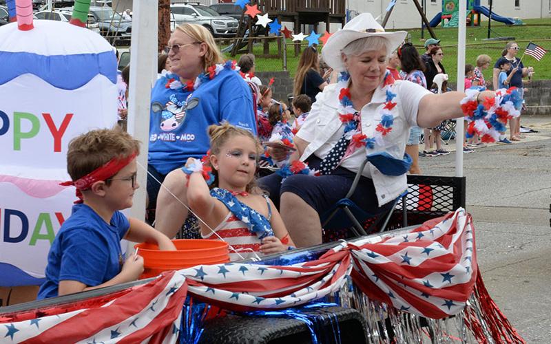 Parade goers were treated to candy from many floats.