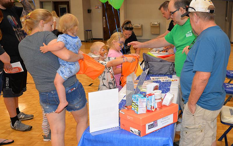 A group of volunteers from Snack in a Backpack was on hand at the Back to School Bash to pass out goodies to the youngsters on hand getting ready for the start of school.