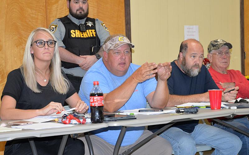 Polk County commissioners, from left, Samantha Trantham, Greg Brooks, John Pippenger and Mush Davis address concerns being expressed over biosolids during last week commission meeting at the Copper Basin Community Center.