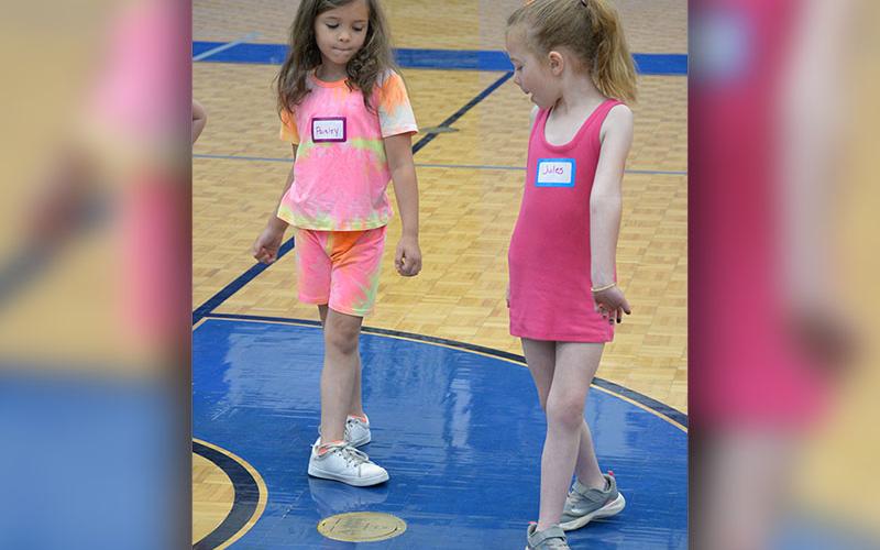 Paisley Southerland, left, and Jules Barton want to be careful not to miss a step at the conclusion of the FCHS mini dance camp.