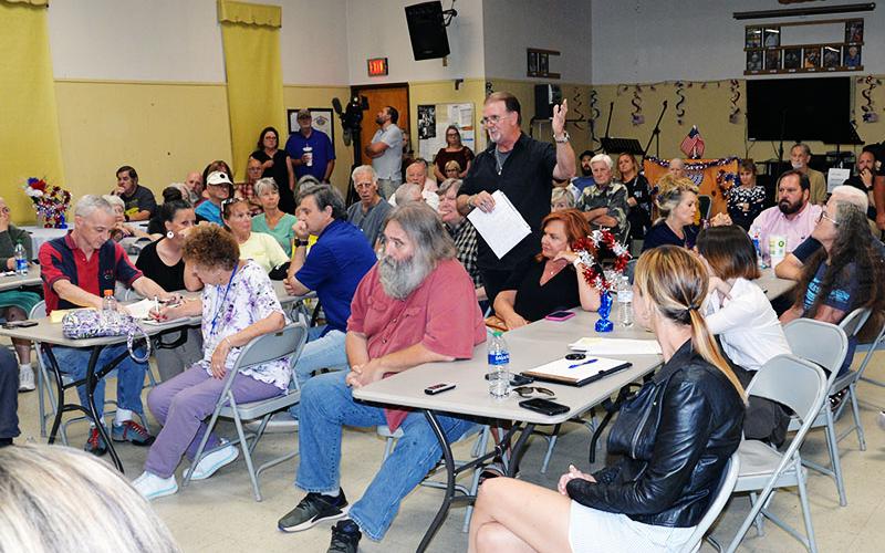 William Allen, standing in black shirt, was one of several area residents to speak when the Polk County commissioners listened to concerns over biosolids during their monthly meeting held Tuesday, June 27, at the Copper Basin Community Center.