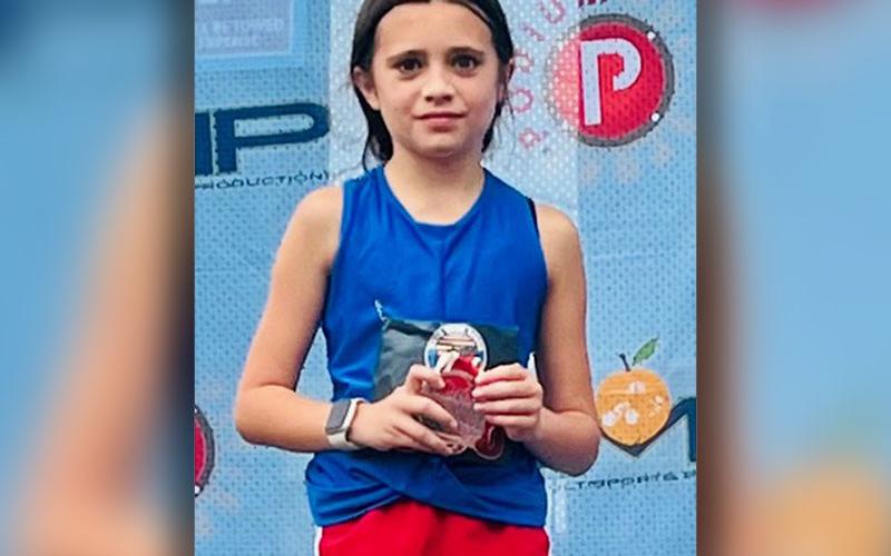 Lila Roof won first place in her age group in the July 4 Freedom 5K in Blue Ridge.