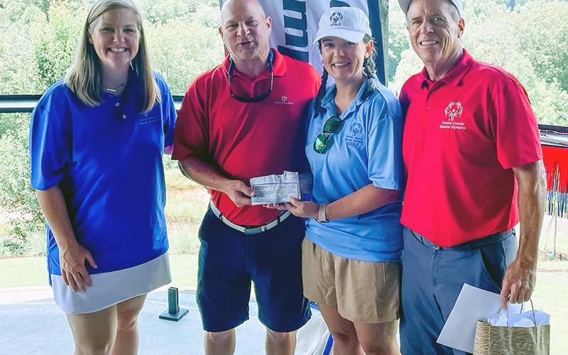 The Men’s Golf Association at Old Toccoa Farm hosted lunch for the Special Olympics golfers and also presented Special Olympics a donation at the end of the Golf Skills event. Shown during the check presentation are, from left, Gini Tipton, Men’s Golf Association President Jeff Lake, Jessica Ramirez, and Craig Hartman, who serves as director of golf for Special Olympics.