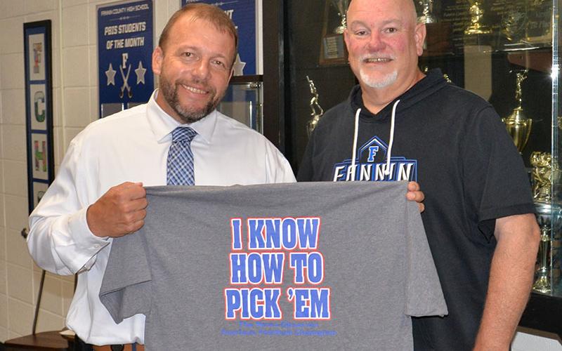 Scott Ramsey stands ready to defend his Fearless Forecaster dynasty as the panel of football prognosticators sharpens their skills for another year. Ramsey has taken home the championship three of the last five years, including the 2022 season title. He’s shown with John Spargo who directs the forecasting panel every week.