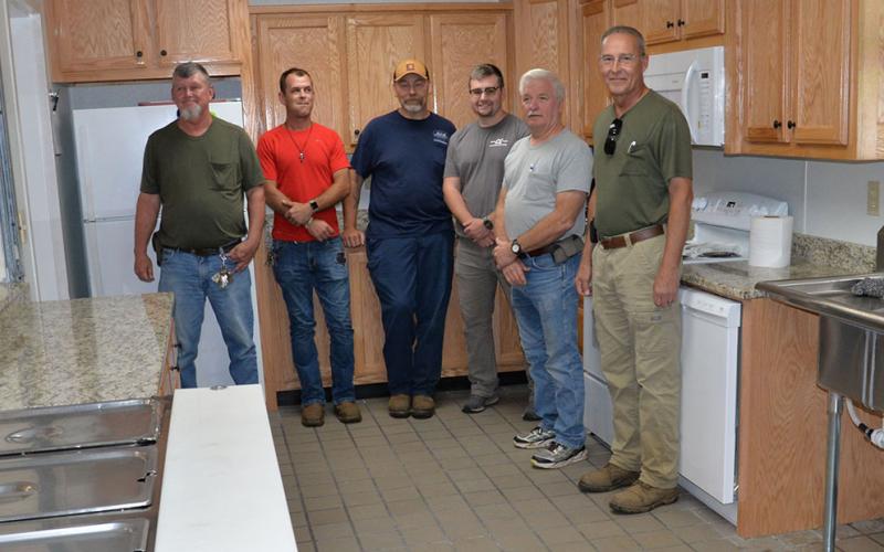 David Miller, Brandon Miller, Terry Ross, Caleb Collins, Ed Hawkins, and John Newton of Fannin County’s Maintenance Department are shown in the Senior Center’s freshly remodeled kitchen. The crew is responsible for the improvements made to the building since it flooded Christmas Eve 2022.
