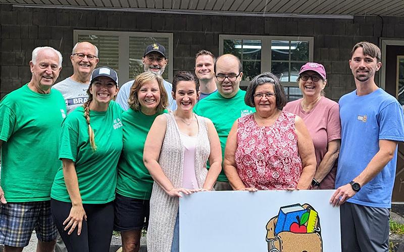 The Family Meals Team that served the Summer Meals Program included, from left, back row, Bill Echelberger, Gordon Riddoch, Russ Peiffer, and Tom MacDonald; and, front row, Margaret Warner, Mary Langford, Victoria Turner, Ben Hughes, Barbara Hughes, Kim Strube, and Zac Meaders.