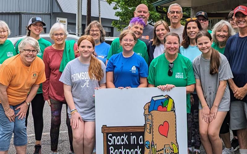 The Volunteer Group that served the Summer Meals Program included from left, back row, Sylvia Goodyear, Margaret Warner, Mack Campbell, Gary Treater, Bob Barnette, and Nick Rebbe; middle row, Gail Dufresne, Marty Kyanka, Lori Barris, Joanne Campbell, Jayne Treater, Lorah Hubbard, Debby Beck, and Thomas Gray; and, front row, Evelyn Murray, Emily Smith, Laura Hughes, Katherine Bailey.
