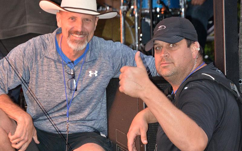 Master of Ceremonies  Rob Kaser, left, and festival organizer Paul Gribble were happy for dry weather at the end of Blues &amp; BBQ.