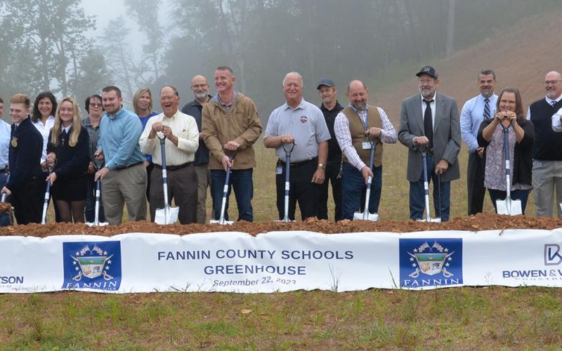 School officials gathered with local leaders for the official groundbreaking for the new Fannin County Schools Greenhouse located next to the Agriculture Facility. Shown during the ceremony are, from left, Shannon Dillard-Miller, Jamie Hensley, Dakoda Moore, Christie Gribble, Kaleighann Ware, Marie Woody, Seth Davis, April Hodges, Bobby Bearden, Erick Youngberg, Chad Galloway, Terry Bramlett, Mike Spurling, Mike Cole, Lewis Deweese, Darren Danner, Rhonda Mathews, David Henson and Scott Ramsey.