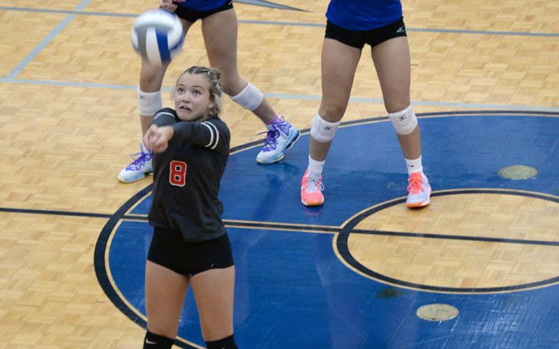 Kendra Deal concentrates on a shot for the Lady Cougars volleyball team earlier this season.