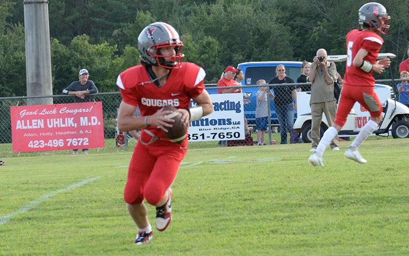 Copper Basin’s Cade Dean looks downfield for a receiver earlier this season.
