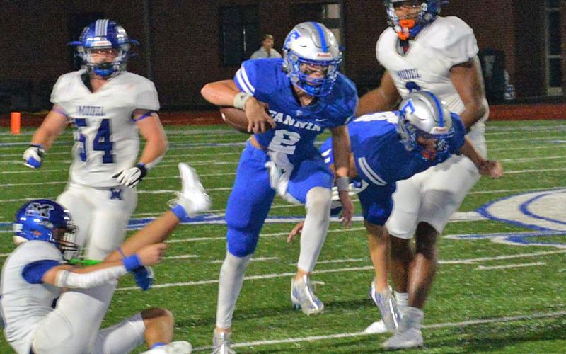 Lawson Sullivan splits the defense for the Fannin County Rebels earlier this season