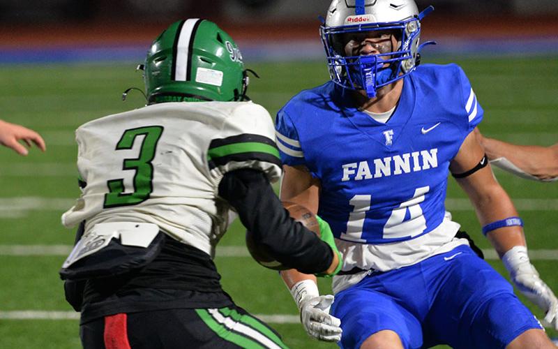 Fannin County’s Cooper Born squares up to tackle a Murray County runner.