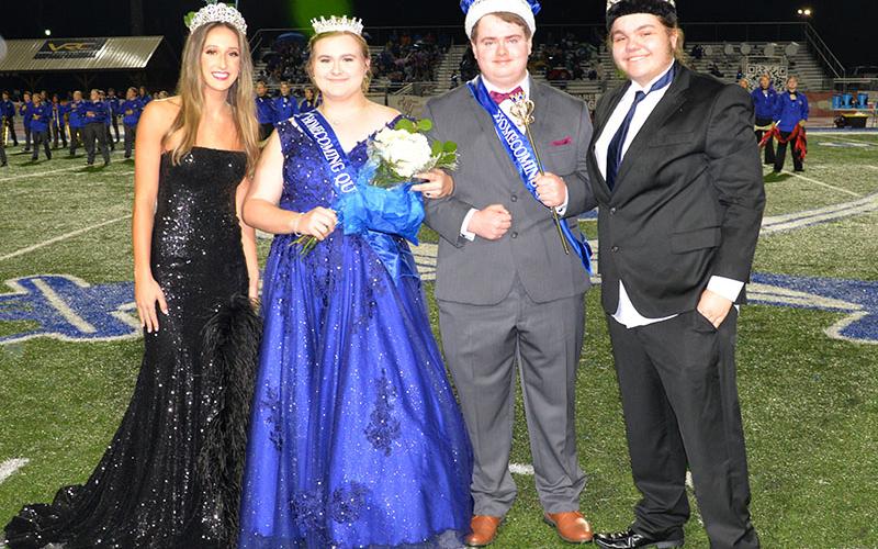 Katlin Jarrett, second from left, was crowned Fannin County High School’s Homecoming Queen Friday night during halftime of the Rebels’ Region 7-AA contest with Model and Ridge Stevens, second from right, was crowned king. Last year’s queen, Reigan O’Neal, crowned her successor and Stevens was crowned by Judd Watson.