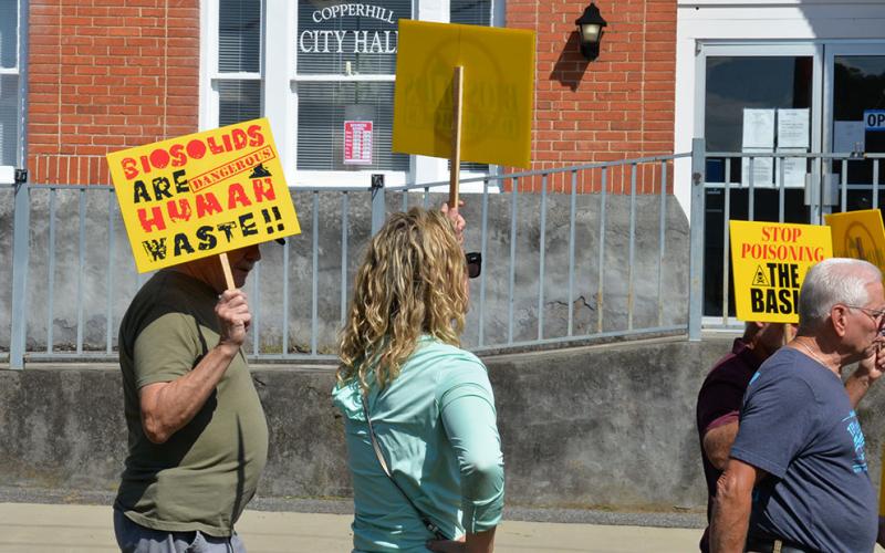 Copperhill City Hall was the final backdrop last week as protesters sought government help to stop the spread of biosolids at Copperhill Industries. The smell and possible harmful effects on the Ocoee River and underground water supply were among concerns.