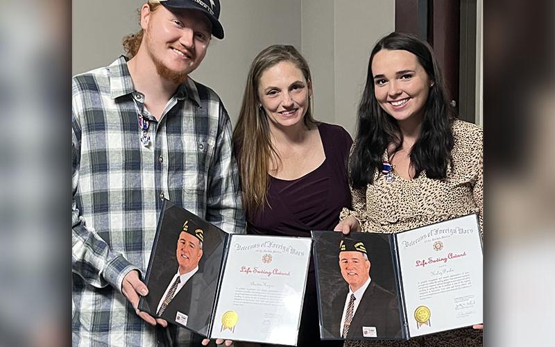 Austin Hayes and Haley Parks, right, are shown with April Michelle Burrell of Murphy, North Carolina. Hayes and Parks are credited with saving Burrell’s life in 2022 following a car crash on Highway 60.