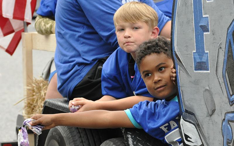 Some of Fannin County’s children were able to take part in the parade by riding on the floats and throwing out candy for the bystanders.