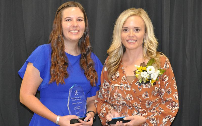 Katy Roberson, right, a first grade teacher at West Fannin Elementary School, was named as Fannin County’s Teacher of the Year at the annual banquet honored the top educators October 3 at the Fannin County Agriculture Center.  Teacher of the Year runner up, Tessa Fowler, left, is a pre-K teacher at East Fannin Elementary School
