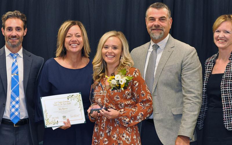 Fannin County Teacher of the Year Katy Roberson, center, was recognized by her peers for the award, which was presented during an annual banquet at the Fannin County Agriculture Center. Shown following the announcement are, from left, Chief Academic Officer Dr. Lucas Roof, West Fannin Elementary School Principal Allison Danner, Katy Roberson, Chief Operations Officer Darren Danner, and School Superintendent Shannon Dillard-Miller.