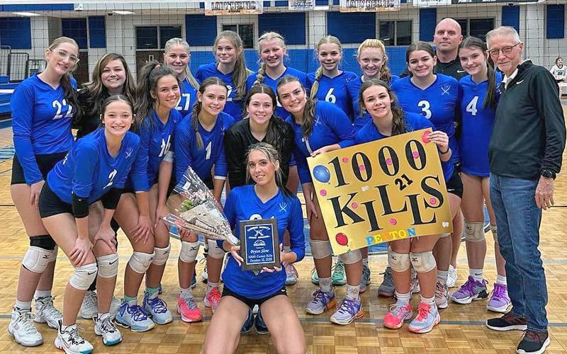 Peyton Stone, kneeling in front, was honored for her 1,000th kill that occurred during a recent match for the Fannin County Lady Rebels.