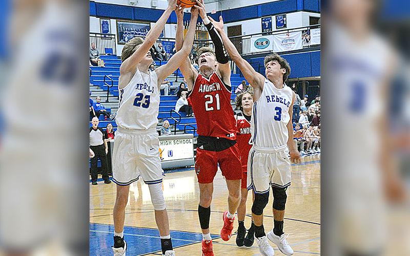 Kolton Kaylor (23) and Ben Bloch (3) battle for a rebound during Fannin County’s scrimmage against the Andrews Wildcats Wednesday, November 15.
