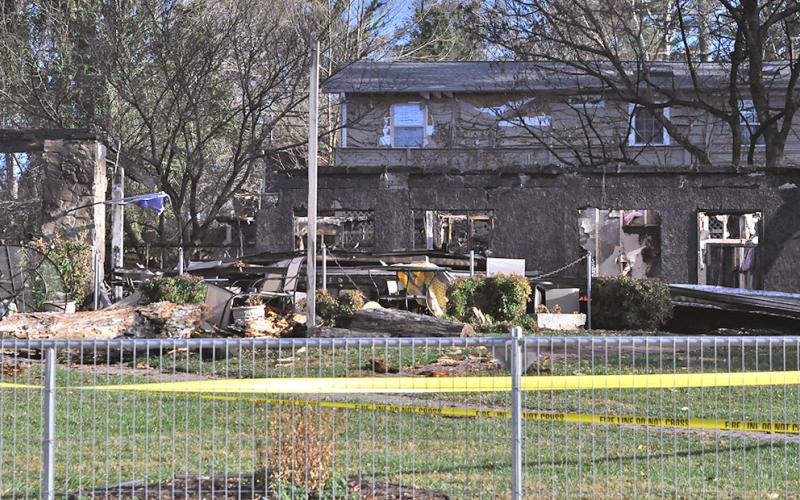 The fire scene off East Main Street in Blue Ridge was littered with debris and damage after the blaze was brought under control by members of three different departments. Joining 56 Fannin County fire fighters in the effort were representatives from both the Gilmer County and Union County department.