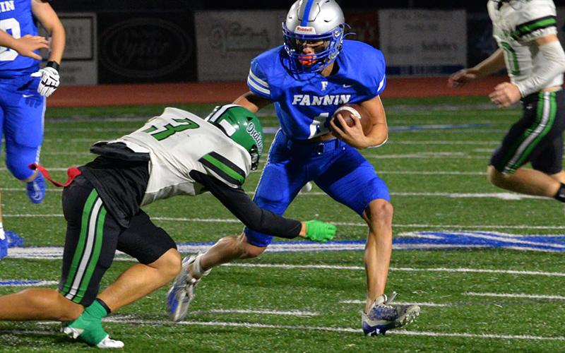 Braden Taylor looks for yardage in previous Fannin County action this year.