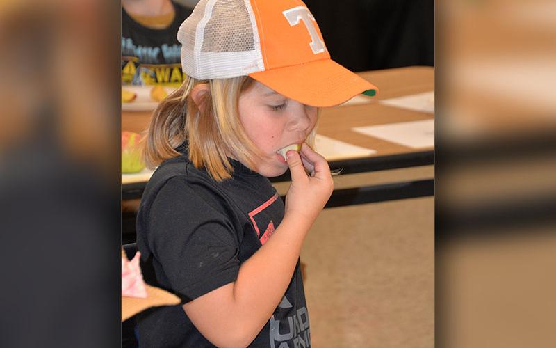 Thaddeus King was among the East Fannin first graders who took part in Apple Day at the Fannin County School System Agriculture Facility. The day included learning the different tastes of different varieties.
