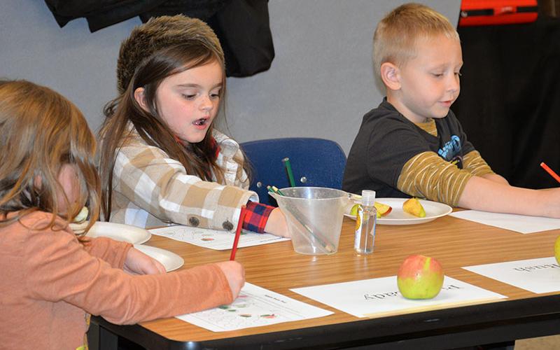 First grade students Addy Shepherd and Killian Dale from East Fannin Elementary School were able to discover more about apples.