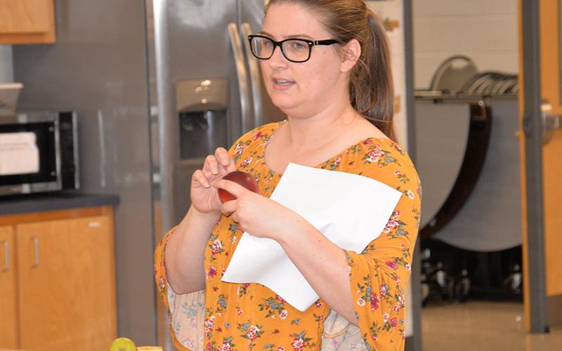 4-H Agent Kate Phillips helped lead the instructions during Apple Day.