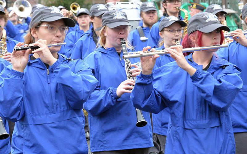 Members of the Fannin County High School Marching Band joined with others in the community to honor veterans Saturday by marching in the annual Veterans Day Parade. Valerie Cash, Lily Bice and Neveah Hill, from left, are shown as the band made its way down East Main Street in Blue Ridge. The band also performed at the Veterans Day ceremony.