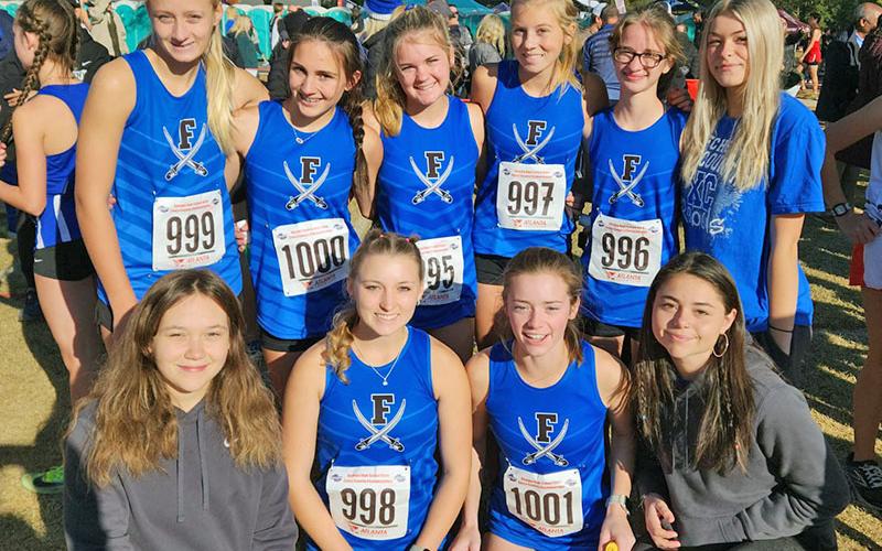 The Lady Rebels finished fifth in Georgia in the Cross Country State Championships held this past Saturday in Carrollton. Shown are, from left, front row, Jaclyn Cracknell, Shaylee Jones, Olivia Temples, and Kristin Cipich; and, back, Kensley Picklesimer, Karli Sams, Annaleigh Cheatham, Lindsey Holloway, Sydney Ford, and Makaylee Clore.